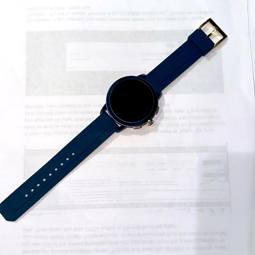 Used Tory Burch DW7T2 smart watch navy silicone band brass hardware